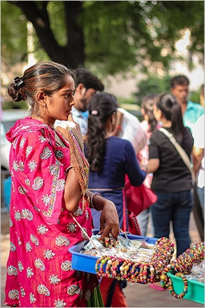 Woman selling jewelry in market