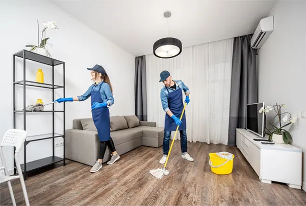 Staff cleaning the room 